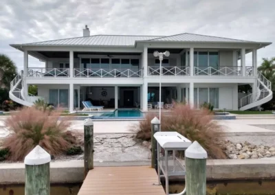 Beautiful 2-story home in front of a canal dock