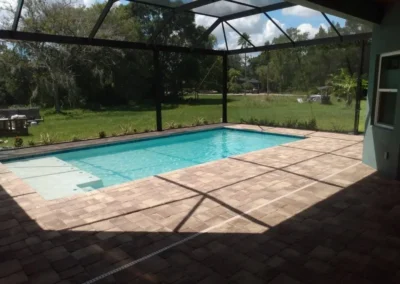 Beautiful paver pool deck is clean and ready for fun